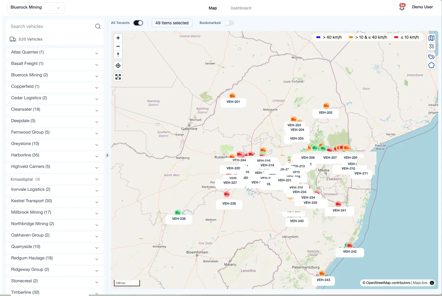 Kimax live map with hundreds of vehicles grouped by carrier, each showing live load and status